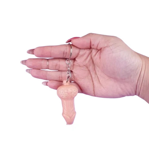 CHAVEIRO ERÓTICO EM FORMATO DE MINI PENIS BEGE