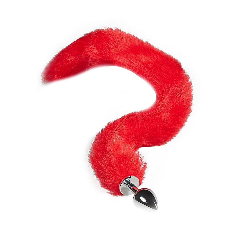 Plug anal rabo de raposa vermelho com corpo em aço inoxidável, formato cônico e cauda macia de 75 cm. Comprimento total aproximado de 82 cm.