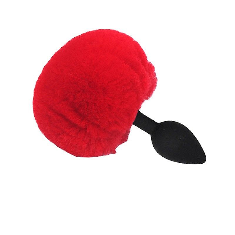 Plug anal de silicone rabo de coelho vermelho tamanho M, com pompom decorativo e saquinho de veludo para guardar.